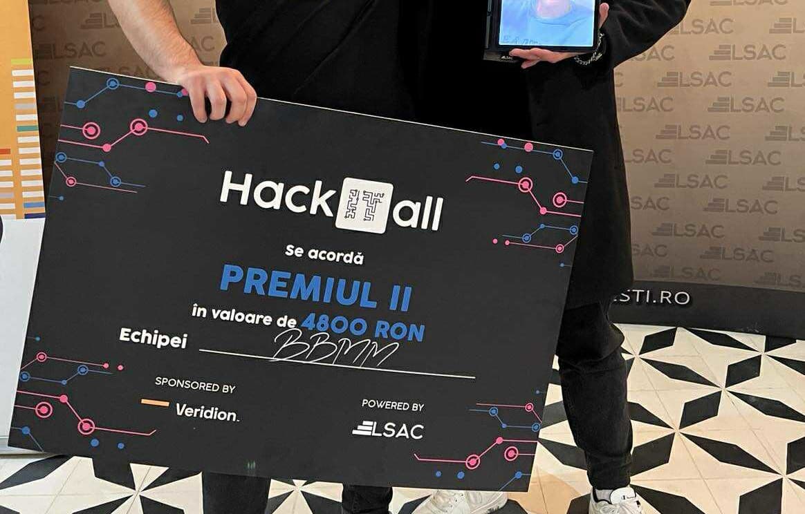 BBMM Software team holding the 2nd place HackITall award