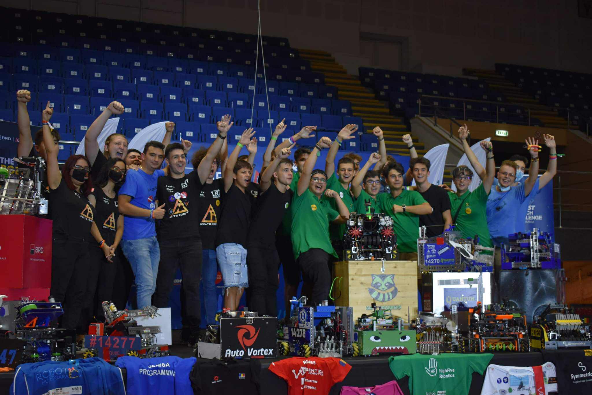Adrian Ioana on stage at an FTC robotics world championship with his team